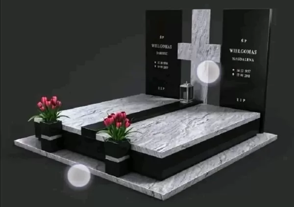 Tento moderní dvojhrob s elegantním kamenným křížem představuje nadčasové řešení pro rodin